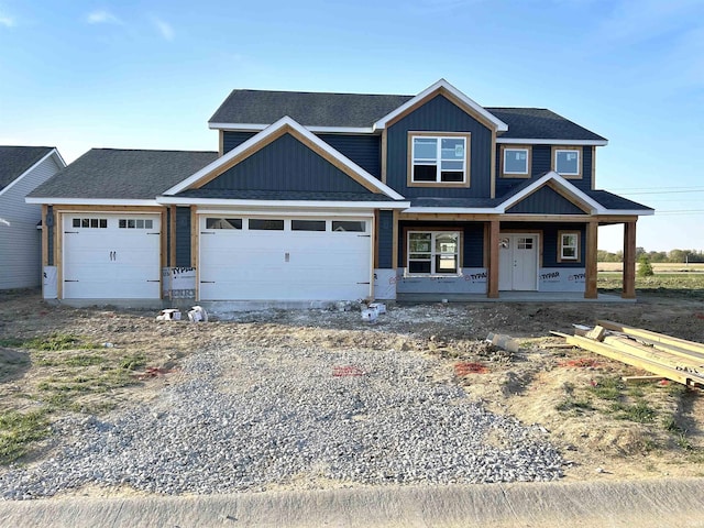 craftsman-style home featuring a porch and a garage