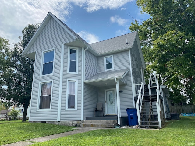 front facade with a front lawn