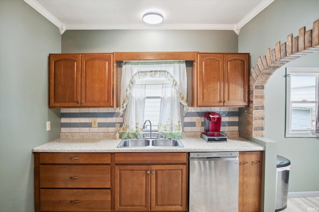 kitchen with tasteful backsplash, light wood-type flooring, dishwasher, sink, and ornamental molding