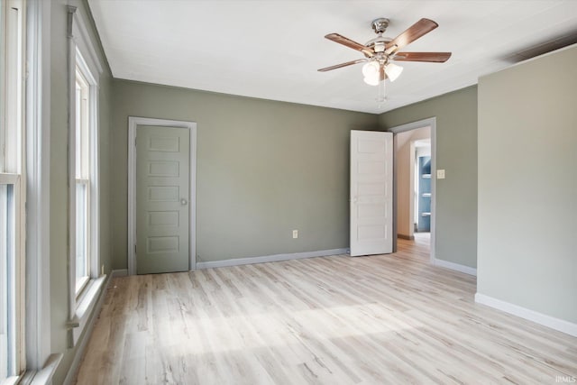 unfurnished bedroom featuring ceiling fan and light hardwood / wood-style flooring