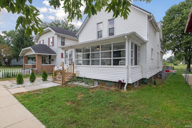 exterior space featuring a front lawn