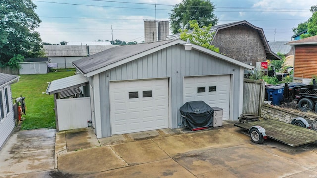 garage featuring a yard