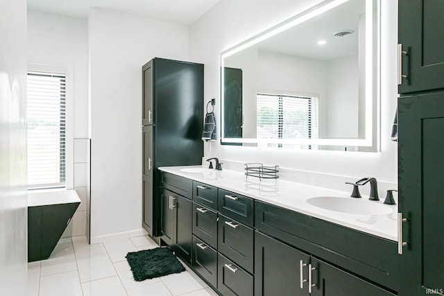 bathroom featuring dual vanity and tile patterned flooring