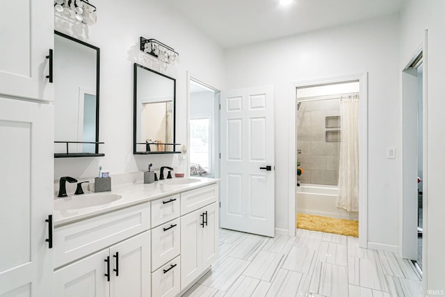 bathroom with dual vanity, tile patterned floors, and shower / bath combo