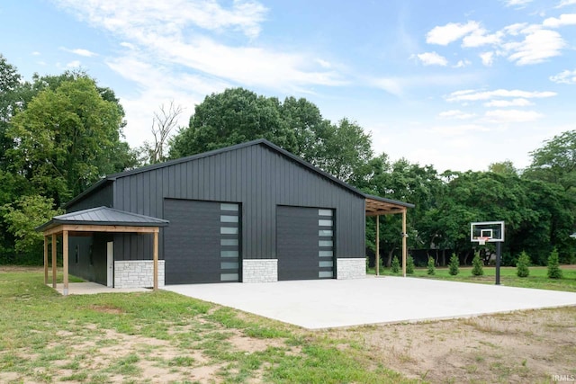 garage with a lawn