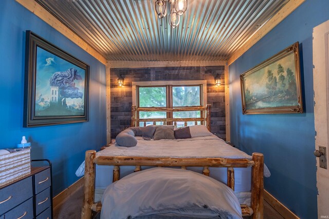 bedroom with a chandelier