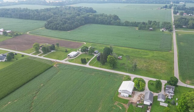 birds eye view of property featuring a rural view