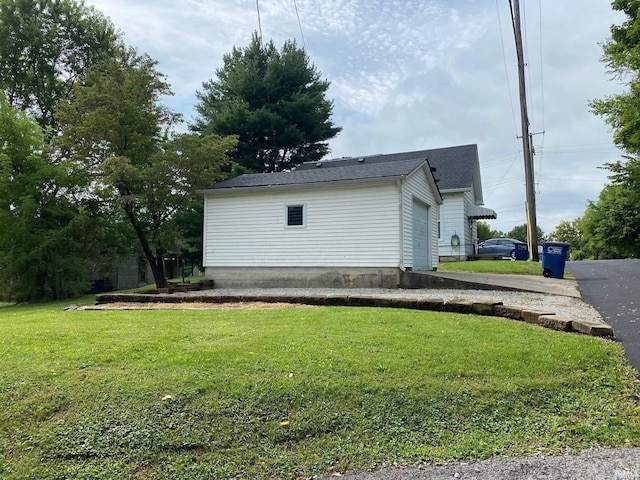 view of home's exterior featuring a lawn