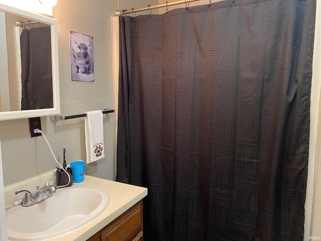 435 16th St, Bedford, IN 47421 - bathroom featuring curtained shower and vanity