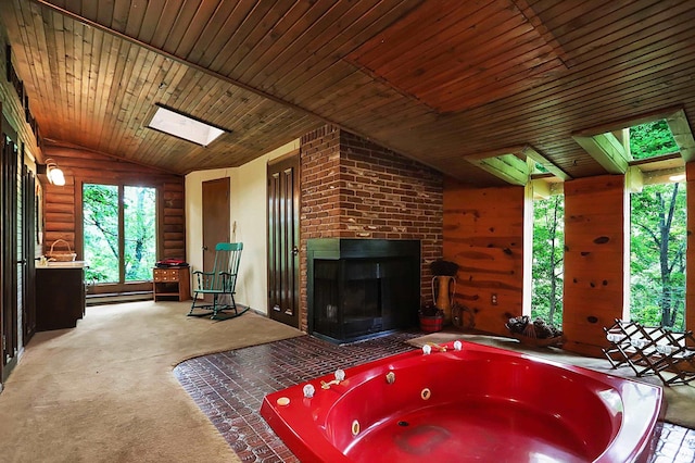 bathroom with wooden ceiling, a baseboard radiator, a fireplace, log walls, and lofted ceiling with skylight