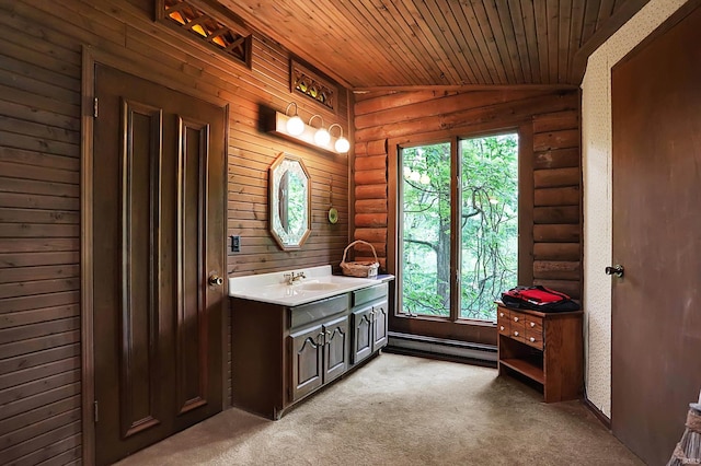 bathroom with a baseboard heating unit, carpet floors, vanity, wood ceiling, and vaulted ceiling