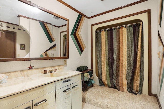 bathroom with vanity and crown molding