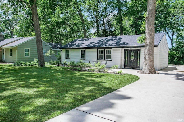 ranch-style house with a front lawn