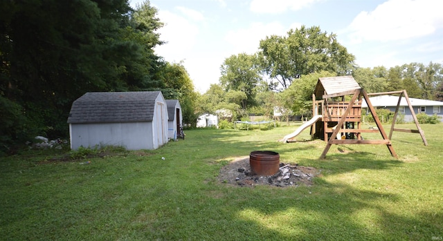 view of yard featuring a shed and a playground