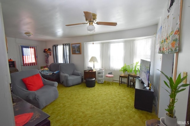 living room featuring ceiling fan and carpet floors