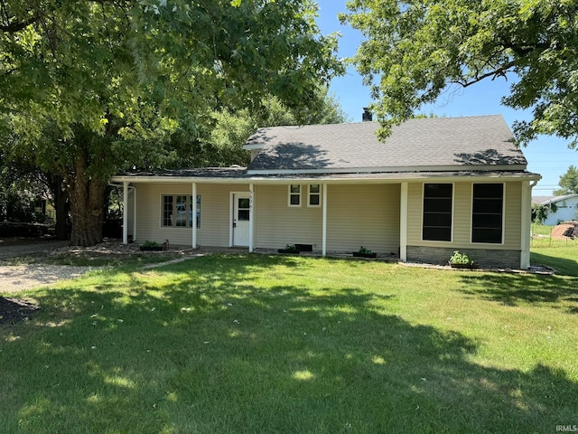 view of front facade featuring a front yard