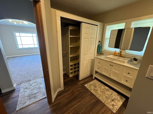 bathroom featuring vanity and hardwood / wood-style flooring