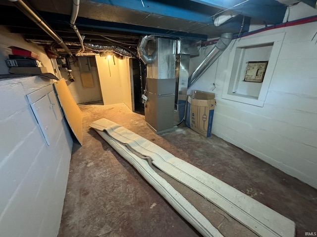 basement featuring heating unit