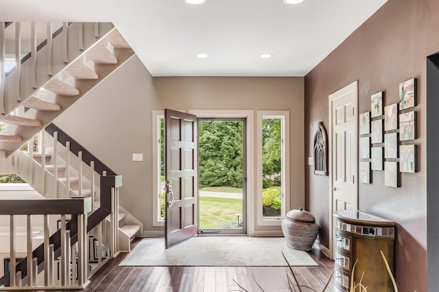 entryway with hardwood / wood-style floors