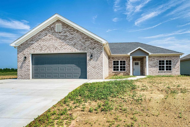 view of front of house with a garage