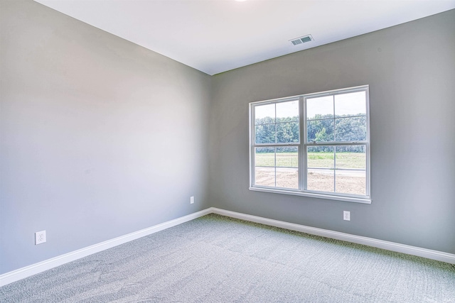 empty room featuring carpet flooring