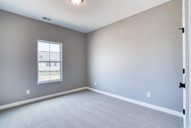 empty room with carpet floors