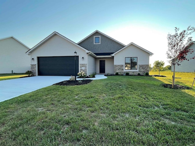 view of front facade with a garage and a front lawn