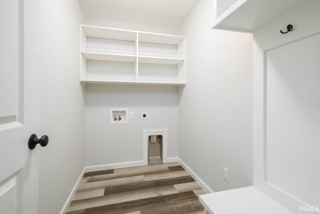 clothes washing area with washer hookup, hardwood / wood-style flooring, and hookup for an electric dryer