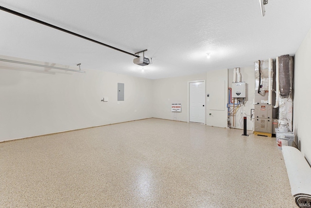 garage with a garage door opener, water heater, and electric panel