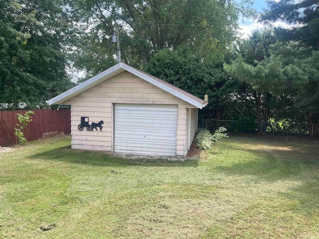 garage with a yard