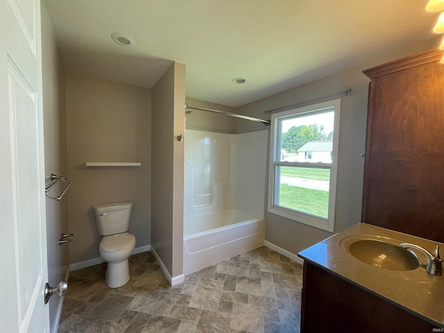 full bathroom featuring a textured ceiling, toilet, tile patterned floors, vanity, and bathtub / shower combination