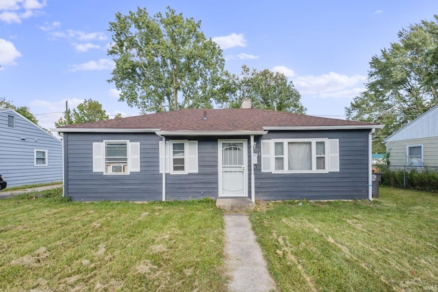 view of front of house featuring a front lawn