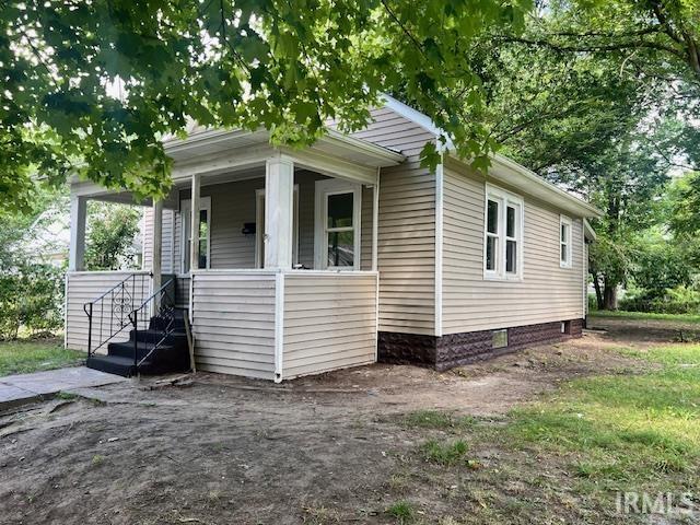 exterior space featuring covered porch