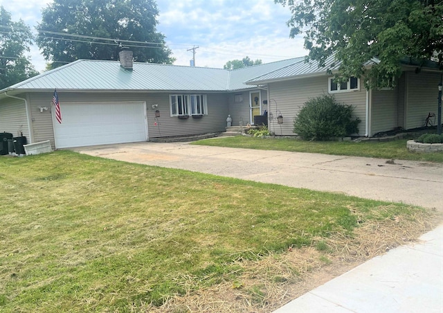 single story home with a front lawn and a garage