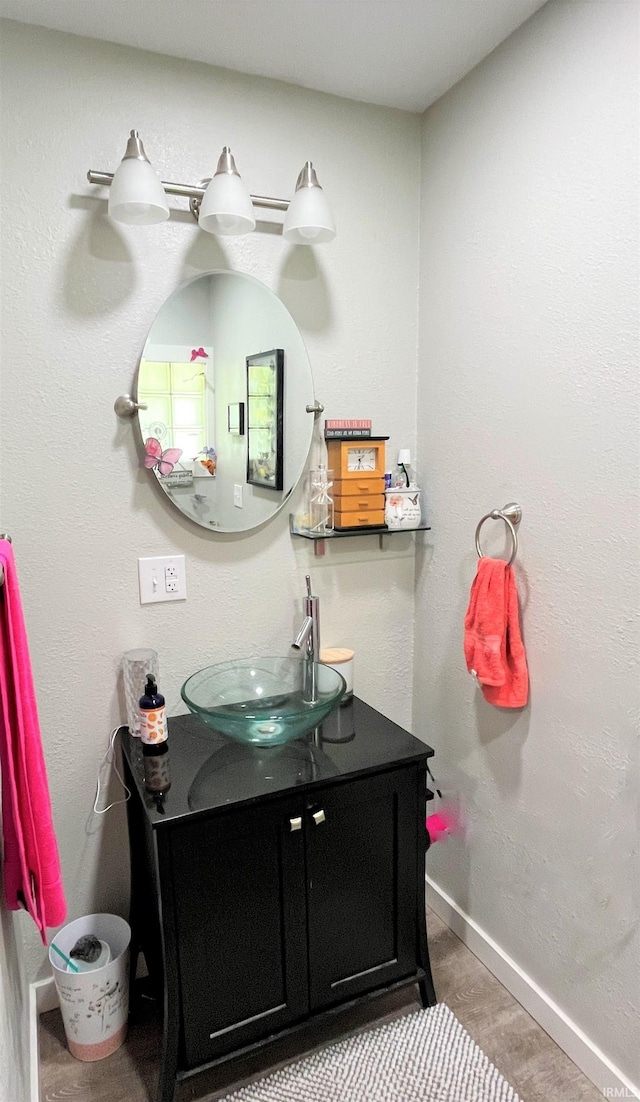 bathroom featuring tile patterned floors and vanity