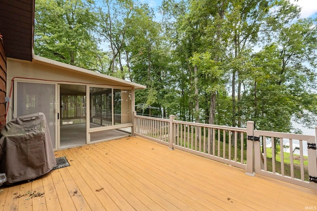 wooden terrace with a sunroom