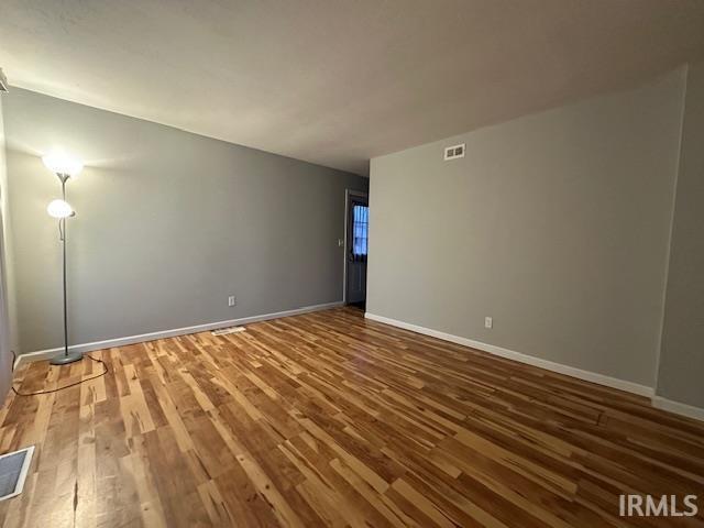 carpeted spare room with plenty of natural light