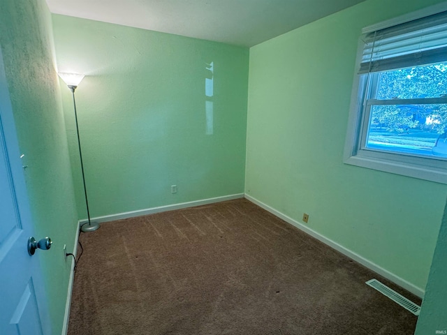 view of carpeted spare room