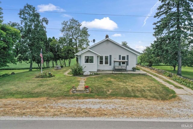 view of front of house with a front yard