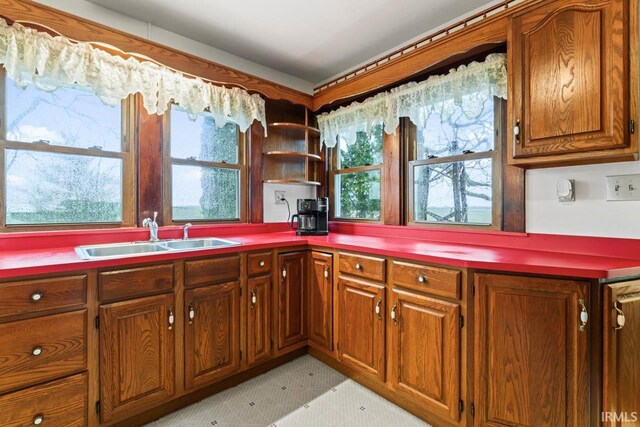 dining area with ceiling fan, beamed ceiling, and dark hardwood / wood-style floors