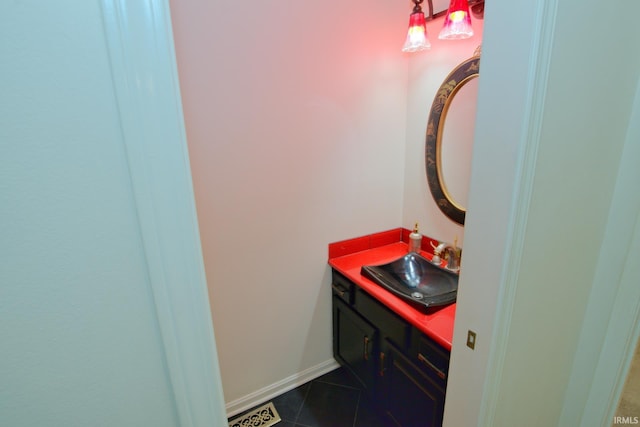 bathroom with vanity and tile patterned flooring