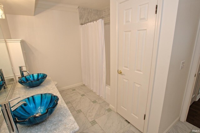 bathroom with vanity and tile patterned flooring