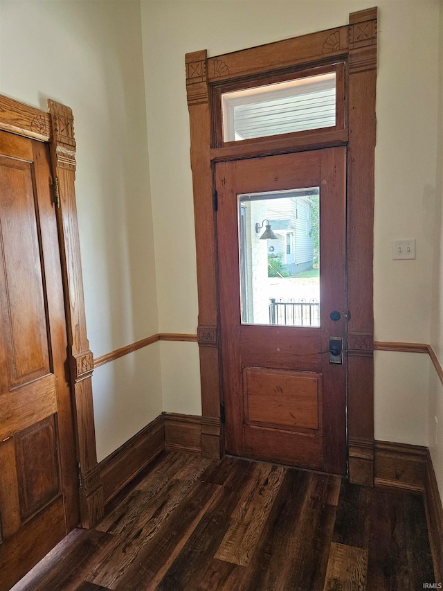 entrance foyer featuring dark hardwood / wood-style floors