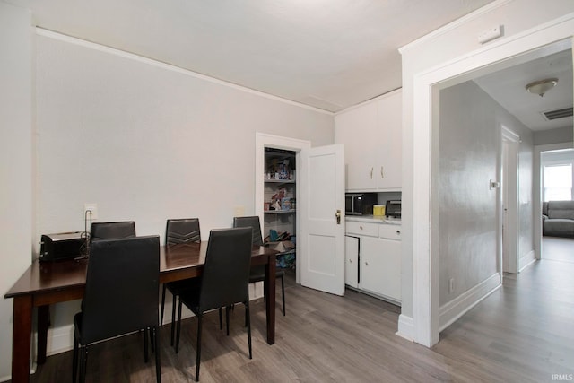 dining room with light hardwood / wood-style floors