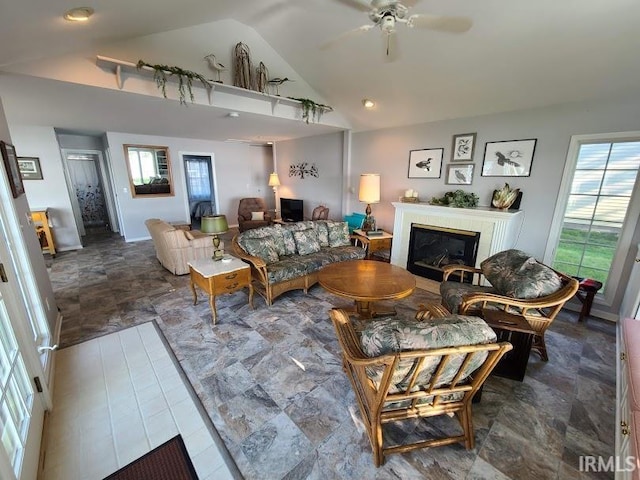 living room featuring lofted ceiling and ceiling fan