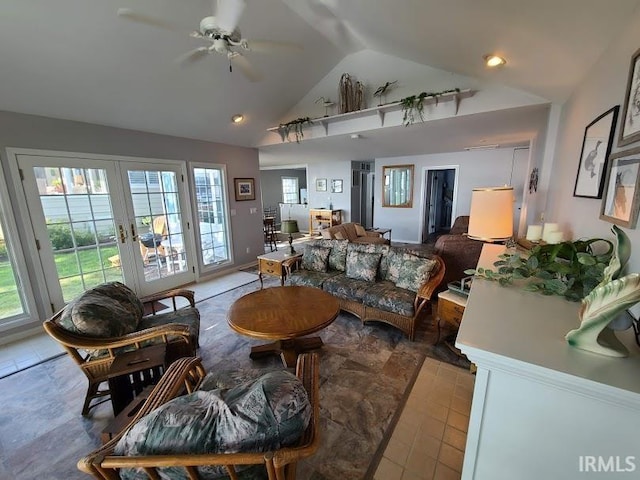 tiled living room with vaulted ceiling and ceiling fan