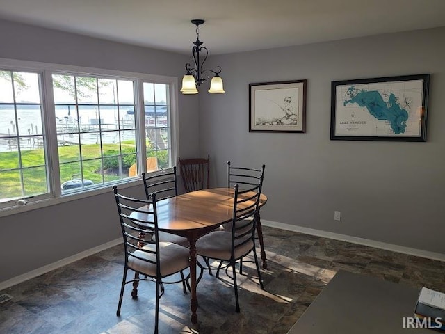 dining area with a chandelier