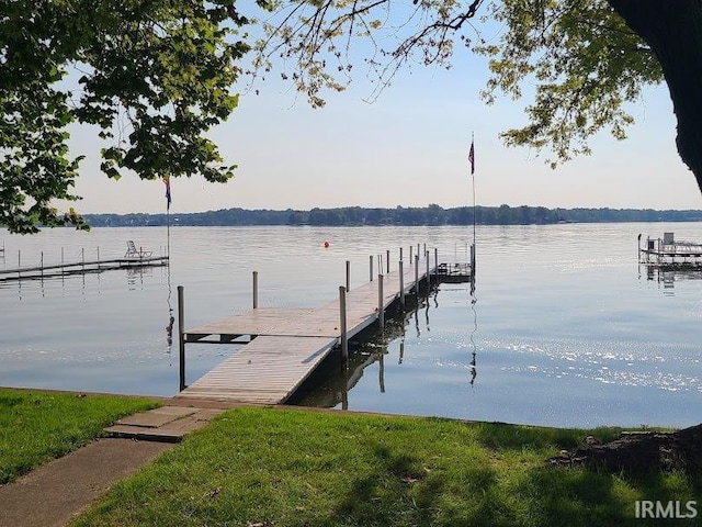 view of dock with a water view