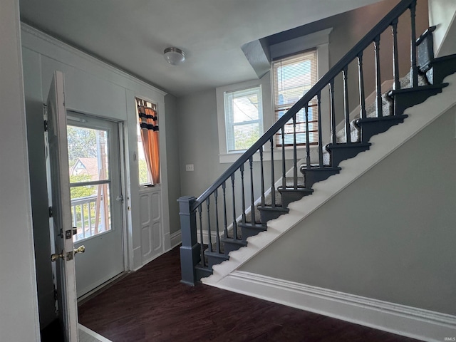 entrance foyer with plenty of natural light and wood-type flooring