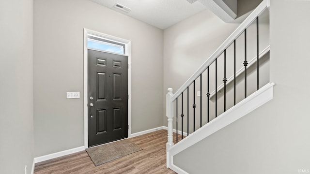 foyer entrance featuring light hardwood / wood-style flooring